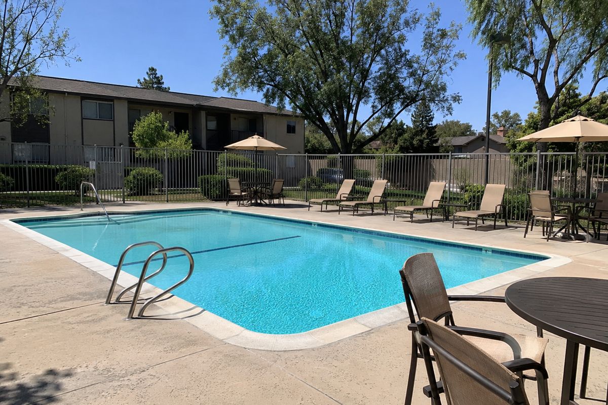 HOA pool area with mountain views